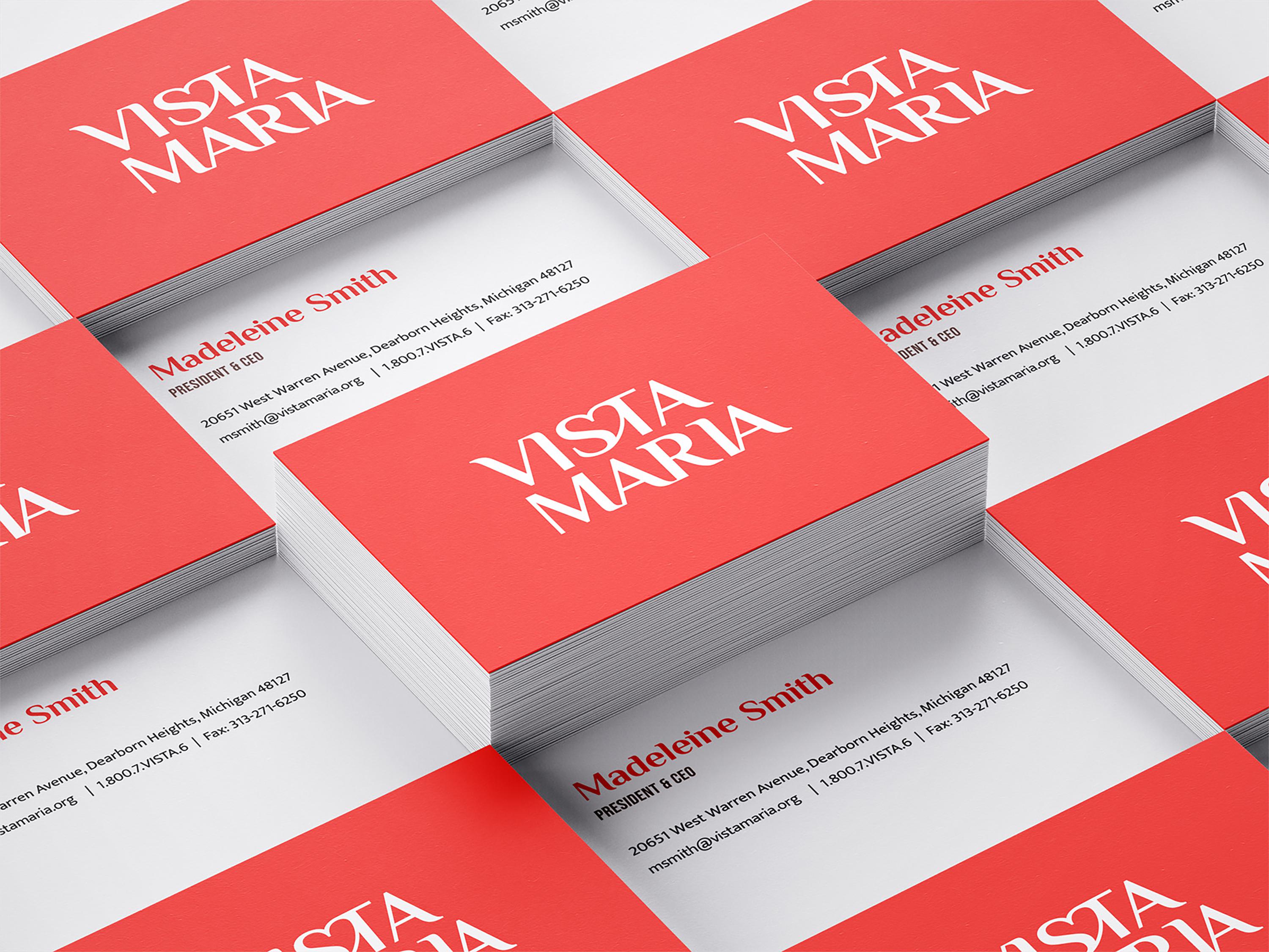 Stacks of Vista Maria business cards - front and back.